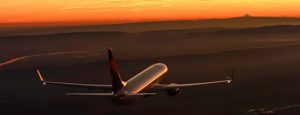 delta-jet-in-sunset-HeroB